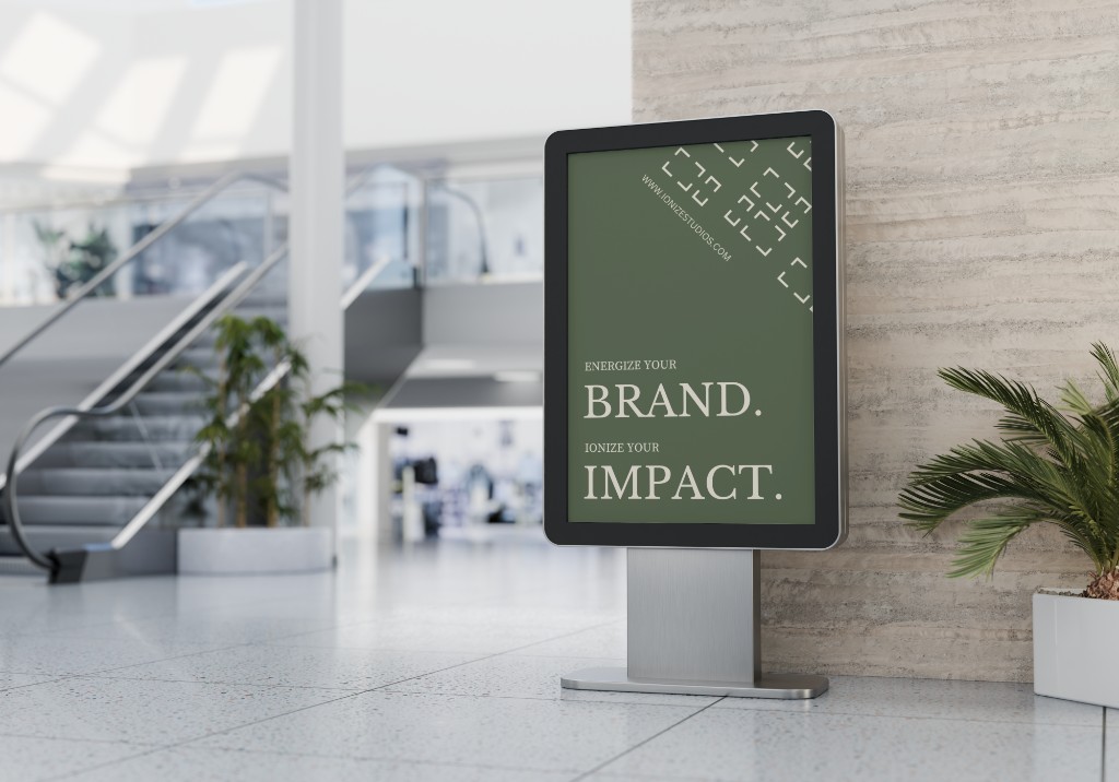 Ionize Studios digital kiosk advertisement in a public atrium